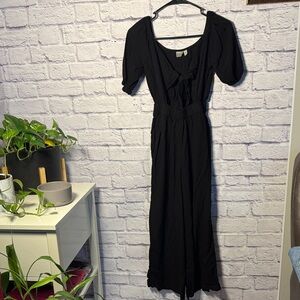 ASOS Black Romper with puffy sleeves and a tie front!